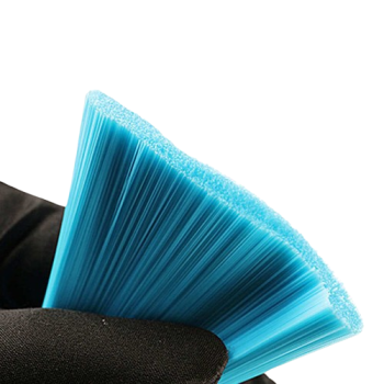 Blue bristle brush close-up part of a cleaning tool